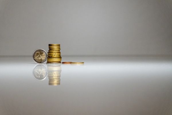 Coins on a reflective background